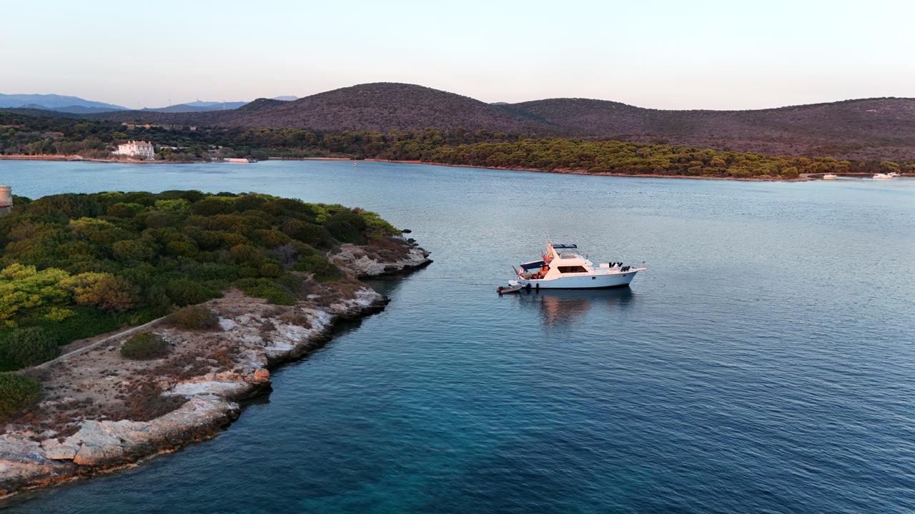 Aerial view of a production support vessel in a Greek cove