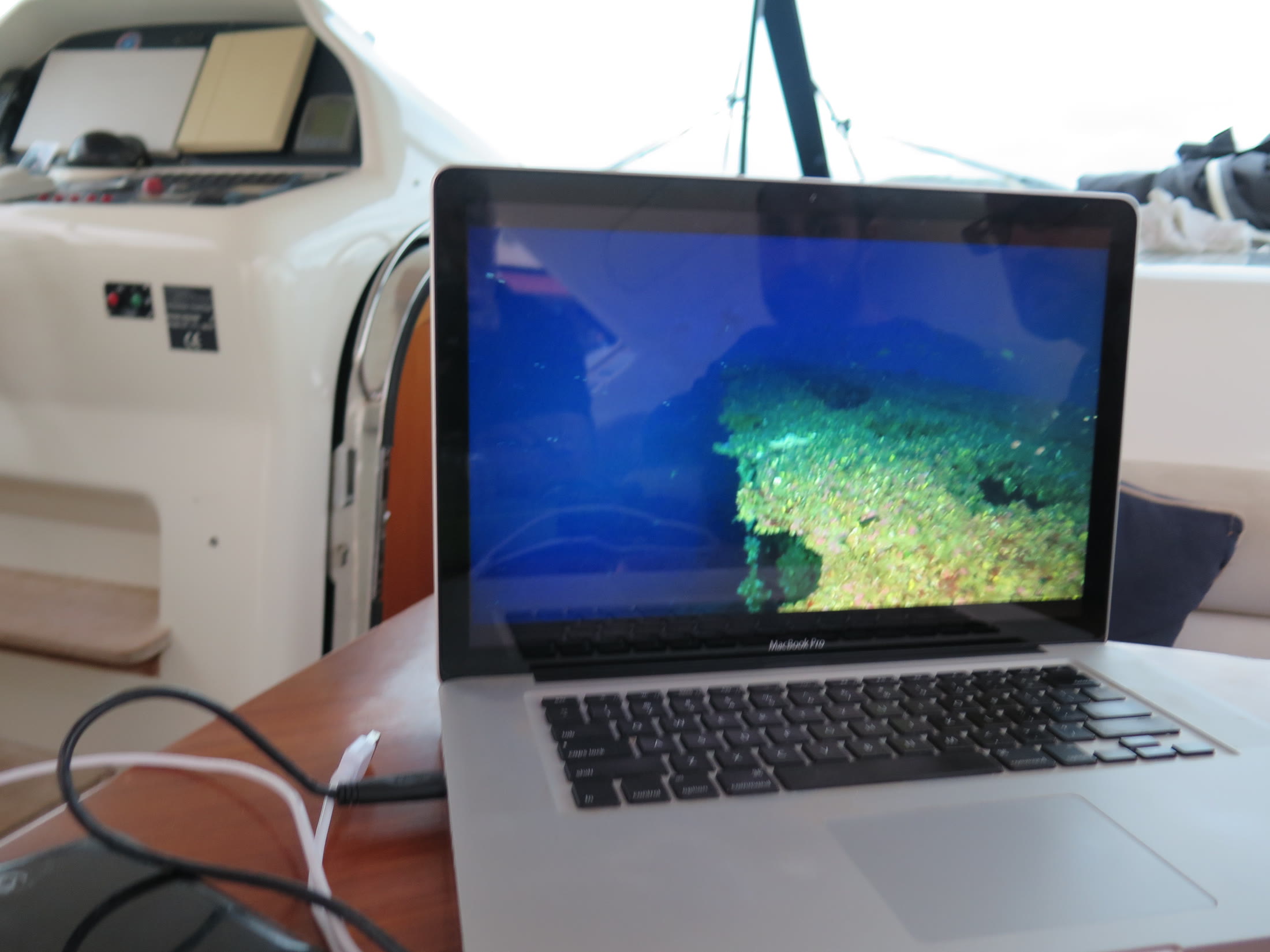 Underwater footage monitored on location aboard the production vessel
