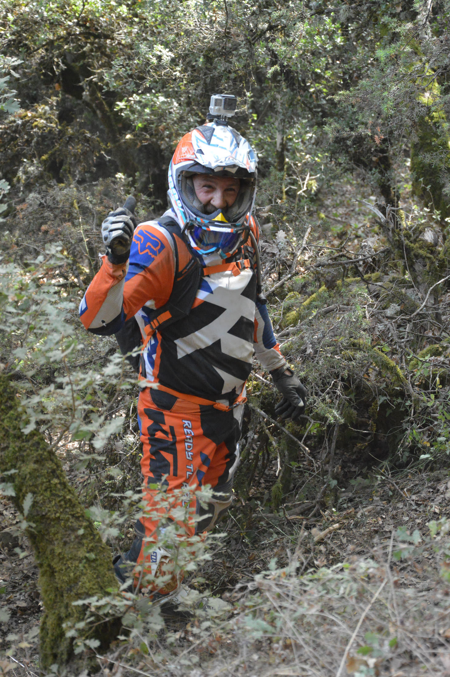 Enduro rider signalling from the mountain course