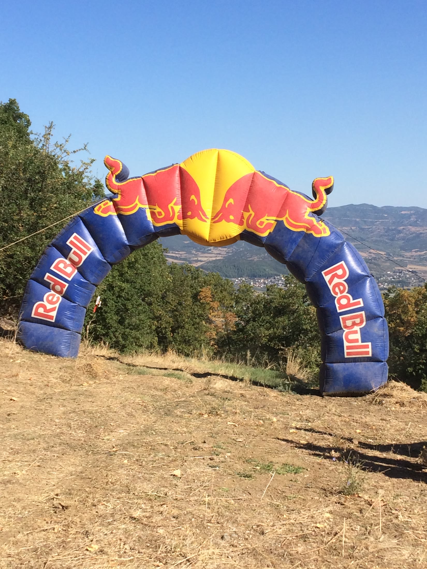 Mountain race course marked by an event arch
