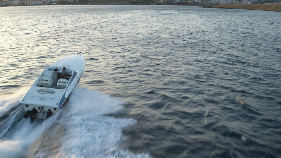 Speedboat filmed from the air during a coastal production